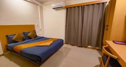 Apex Inn manyata Room Type - Deluxe Double Room