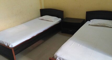 HAPPY LODGE Room Type - BUDGET ROOM NON AC