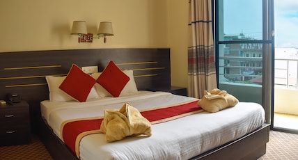 Mirage Inn Pvt. Ltd. Room Type - Deluxe Double Room with Private Attached Bathroom Mirage Inn Pvt. Ltd. Room Type - Deluxe Double Room with Private Attached Bathroom