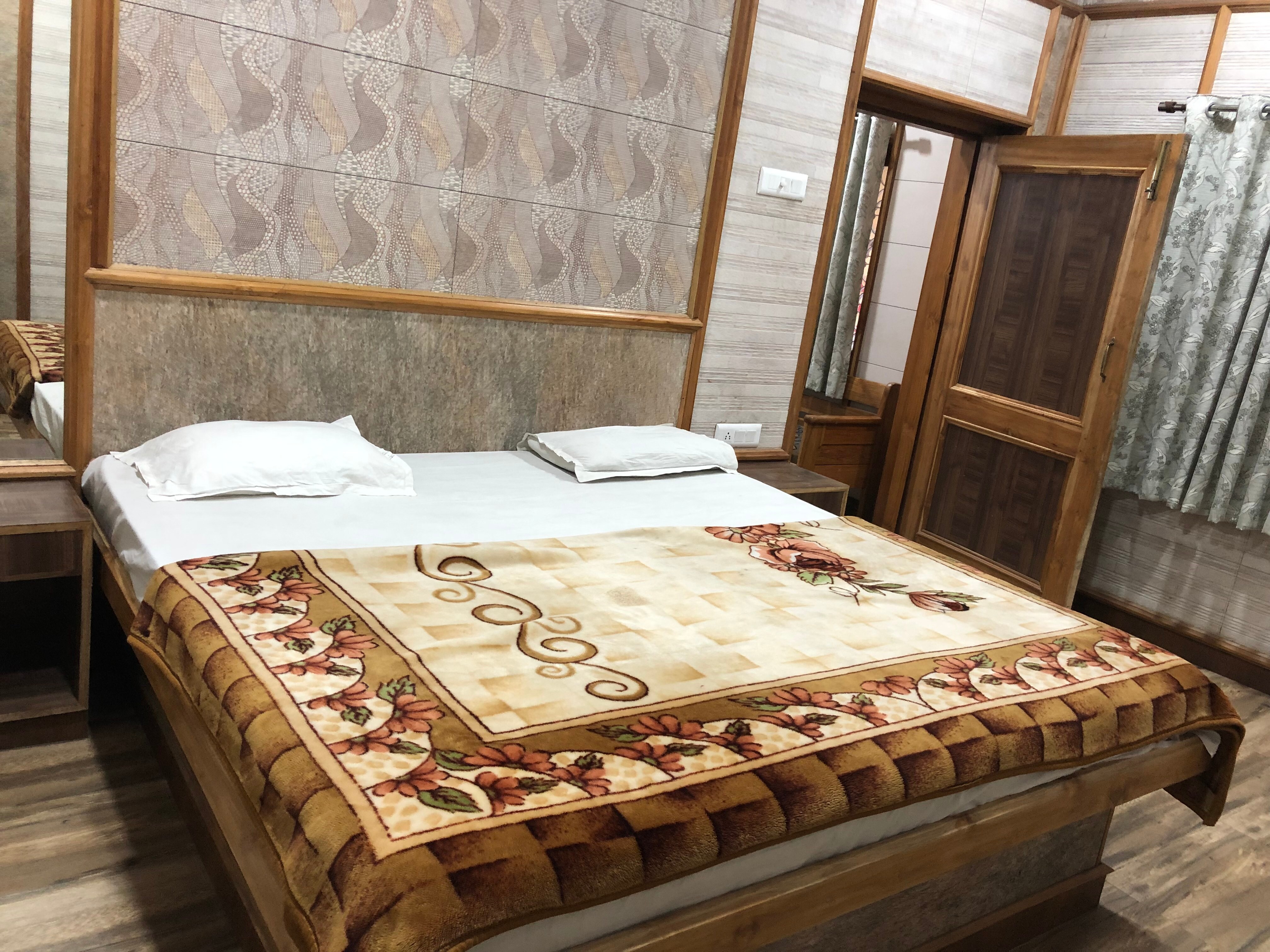 Raja Guest House-Nainital (Double Bed Room) - Tap to explore photos