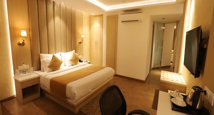Hotel Radiance Room Type - Suite with Living Area and Work Desk