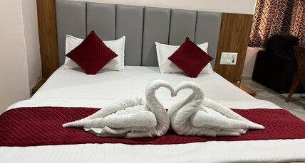 DIVAM COMFORTS Room Type - Deluxe Room with Balcony