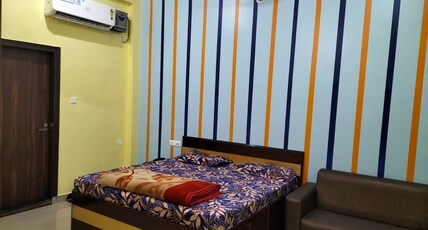 HOTEL NEELKANTH Room Type - Deluxe Room.