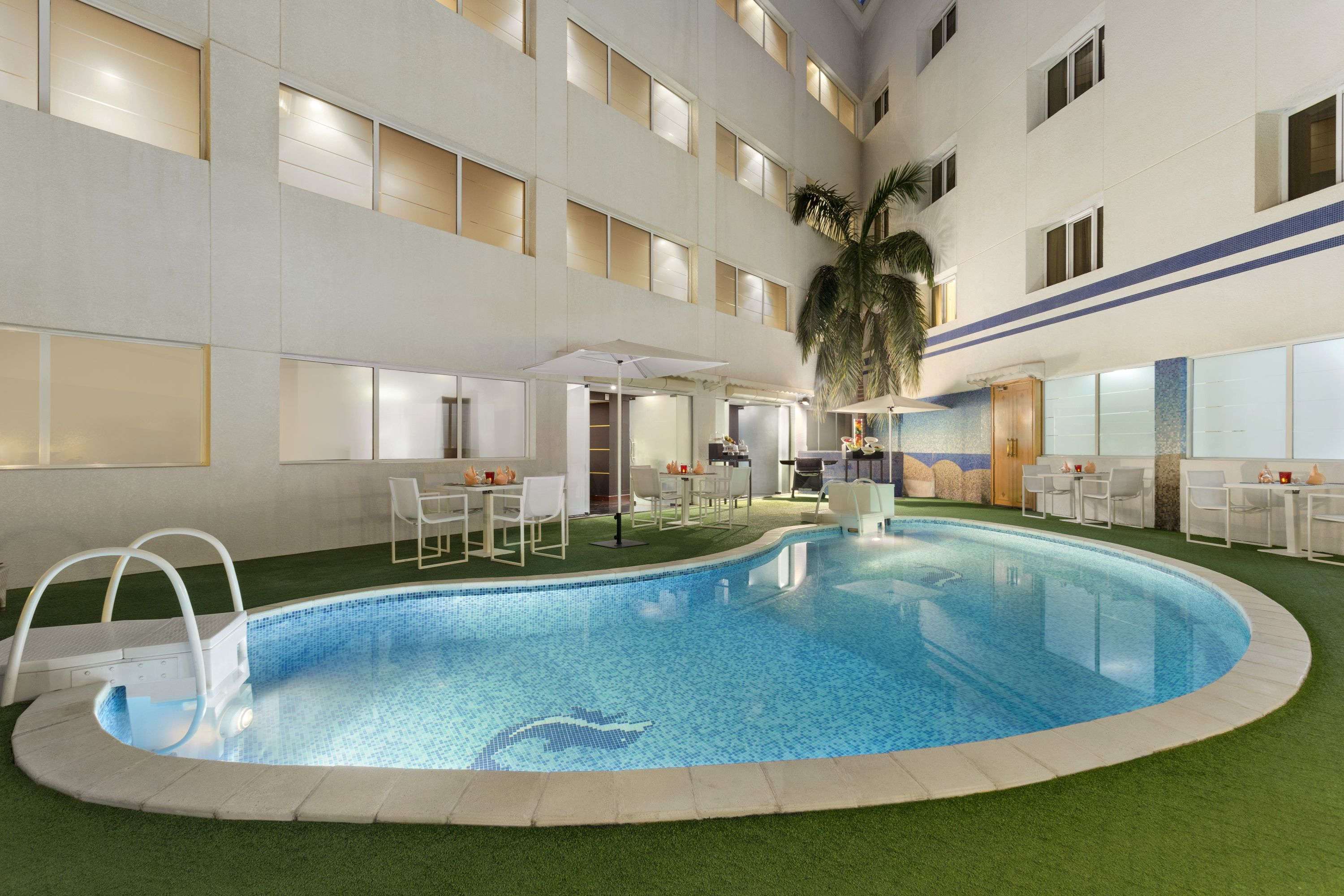 Ramada by Wyndham Qurum Beach - Tap to explore photos