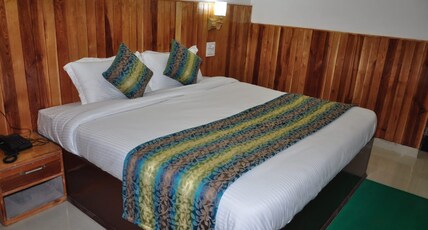 Hotel Aman Palace By Hotel Malabar Room Type - Deluxe Room