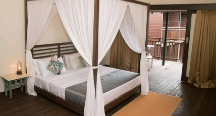 SinQ Beach Morjim. Room Type - Deluxe Beach Cottage-Non sea view Balcony