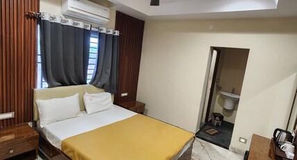 Grand Conventions & Resorts Room Type - Deluxe Room with King Bed