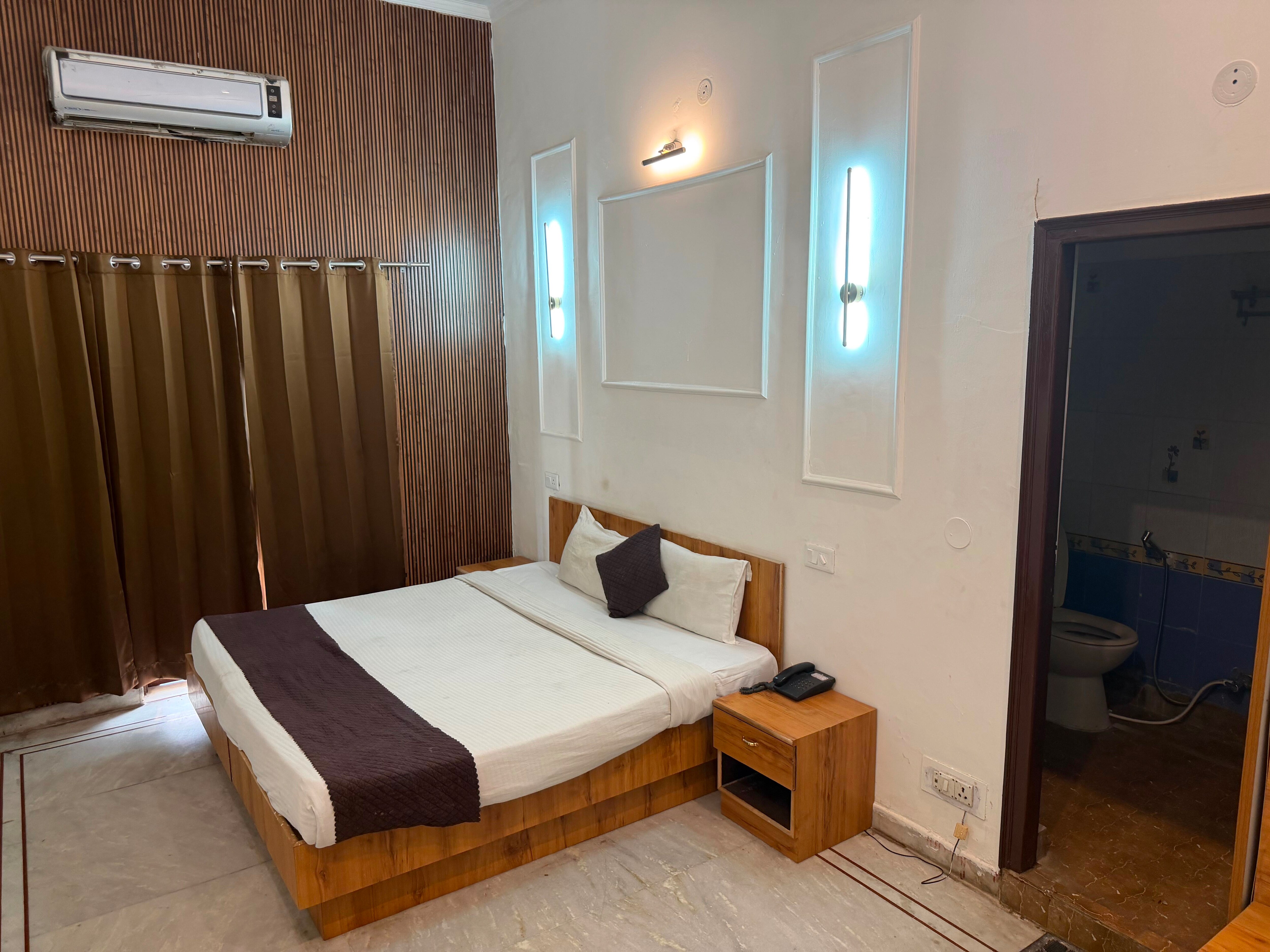 Hotel O Royal Homestay - Tap to explore photos