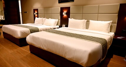 HOTEL SHARADA ELITE Room Type - DELUXE 4 BEDDED