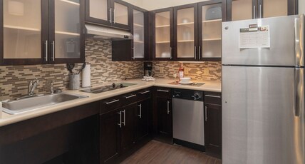 Staybridge Suites MARQUETTE, an IHG hotel Room Type - 1 Bedroom Suite Communications Accessible Tub 1 King Staybridge Suites MARQUETTE, an IHG hotel Room Type - 1 Bedroom Suite Communications Accessible Tub 1 King