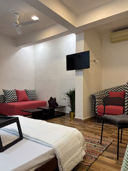 Cozy Rose Apartments off Carter Rd Bandra W - Tap to explore photos
