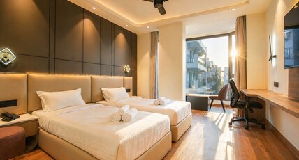 Melange Hotel - Golf course road Room Type - Superior Twin Room