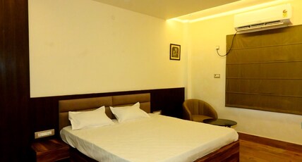Krishna Greens Hotels Room Type - super deluxe room