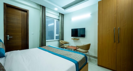 The Palms Inn near Medanta Room Type - Deluxe Room The Palms Inn near Medanta Room Type - Deluxe Room