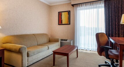 Best Western Plus Oswego Hotel and Conference Center Room Type - Suite-1 King Bed, Non-Smoking, River View, Sofabed, High Speed Internet Access, Refrigerator, Full B Best Western Plus Oswego Hotel and Conference Center Room Type - Suite-1 King Bed, Non-Smoking, River View, Sofabed, High Speed Internet Access, Refrigerator, Full B