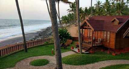Blue Water Beach Resort Room Type - Sea Facing AC Classic Wooden Cottage