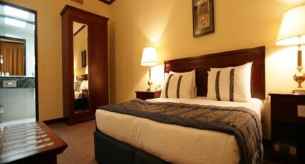 Rolla Suites  Room Type - Premium Room King