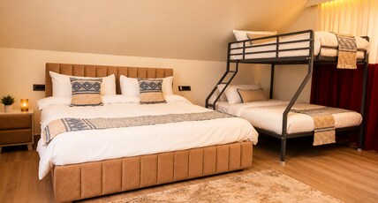 Mayura Retreat. Room Type - Luxury Cottage with Bunk Bed