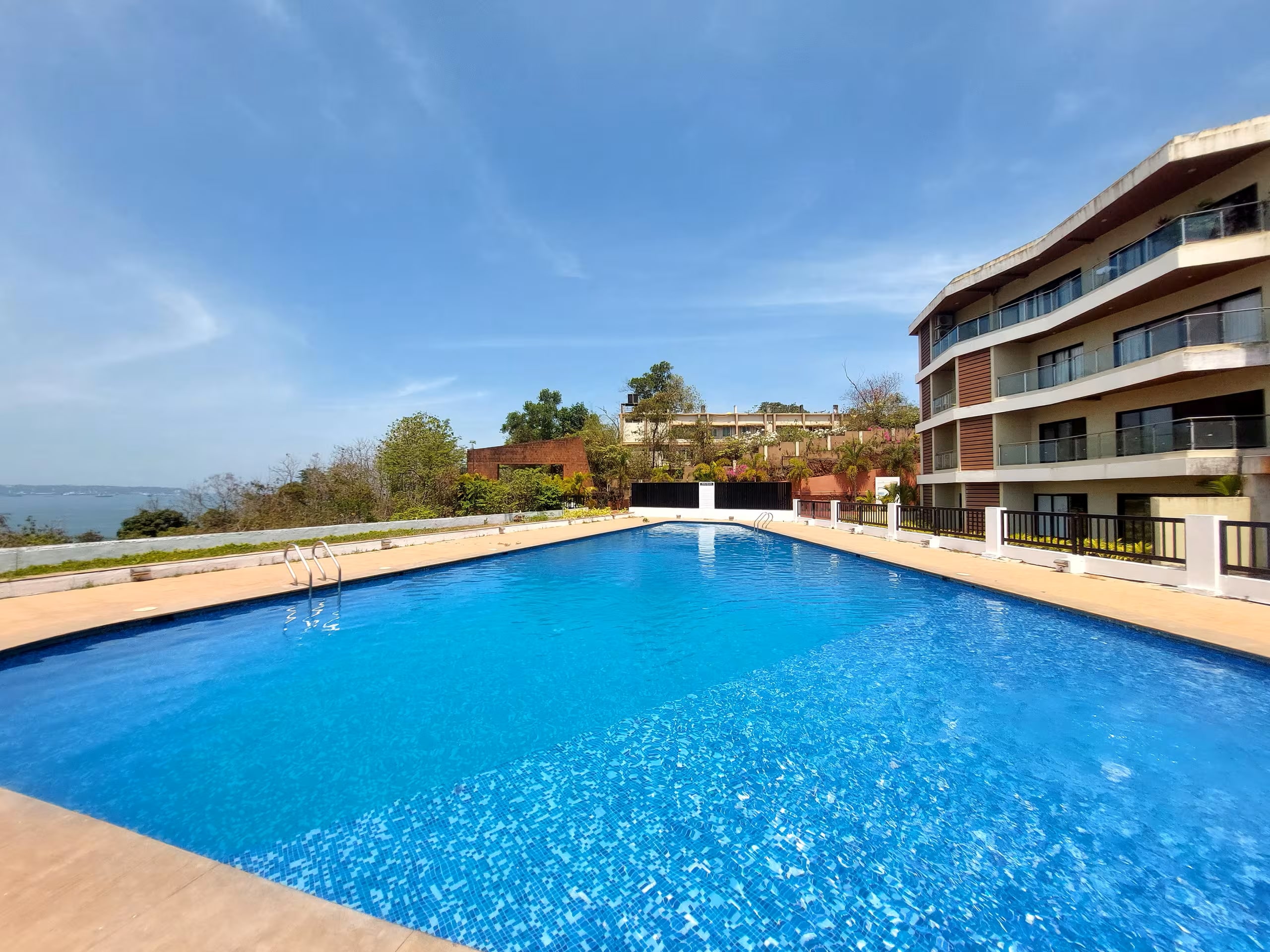 Elegant Sea View 2BHK in Panjim w/ Shared Pool - D002 - Tap to explore photos