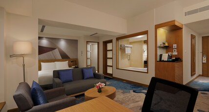 Novotel Hyderabad Convention Centre Room Type - Junior Suite with Bathtub, Queen Bed and 2 way airport transfers Novotel Hyderabad Convention Centre Room Type - Junior Suite with Bathtub, Queen Bed and 2 way airport transfers