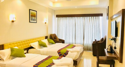 Regalia Inn & Suites Room Type - 3 Bedded AC Family Room