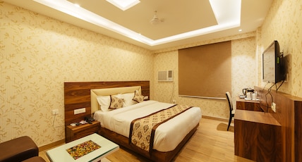 Radical Palace Room Type - Executive Deluxe Room, 24 hrs checkin & checkout, 15 Percent discount on Food Bill Radical Palace Room Type - Executive Deluxe Room, 24 hrs checkin & checkout, 15 Percent discount on Food Bill
