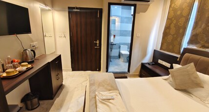 Kashi Darshan Stay Room Type - Deluxe Room