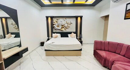 The Glitch Hotel And Restaurant Room Type - Suite AC room with Living Area With King Bed