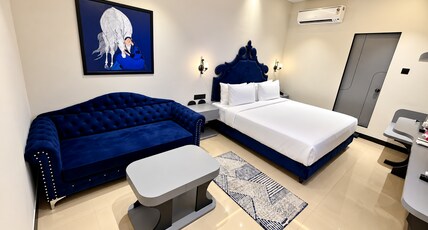 Hotel Nova Ways Room Type - Business Suite with Premium Sofa and Large 50 Inch Web Os. T.v. with High Speed Internet