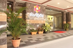 Capital O 90897 Island City Hotel