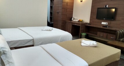 Hotel Holiday Palace & Tarang Restaurant Room Type - Classic Room Hotel Holiday Palace & Tarang Restaurant Room Type - Classic Room