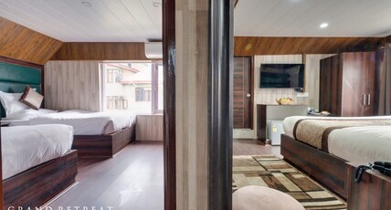 HOTEL GRAND RETREAT Room Type - Deluxe Room