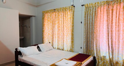 Vrindavan Homestay | 5mins Drive to Guruvayur Temple Room Type - Standard AC Room