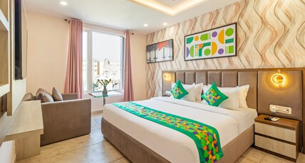 Treebo Premium Paarth Grand with Pure Veg Restaurant Room Type - Deluxe Room