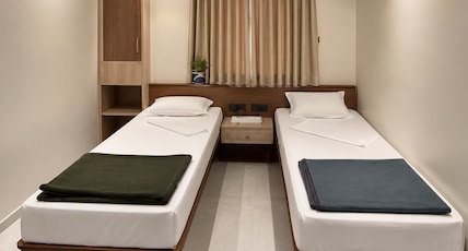 Hotel Dhanashri Room Type - Twin Room Non Ac Hotel Dhanashri Room Type - Twin Room Non Ac