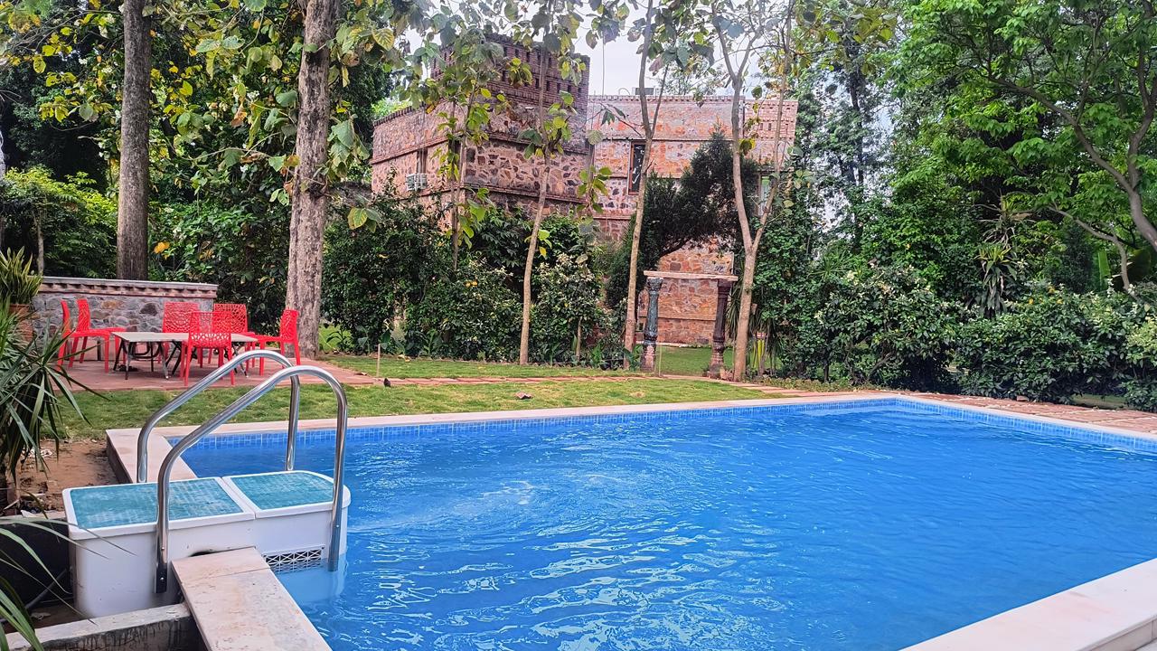 Willows Estate By Under My Roof in Gurgaon | 5BHK Rustic Farmhouse - Tap to explore photos