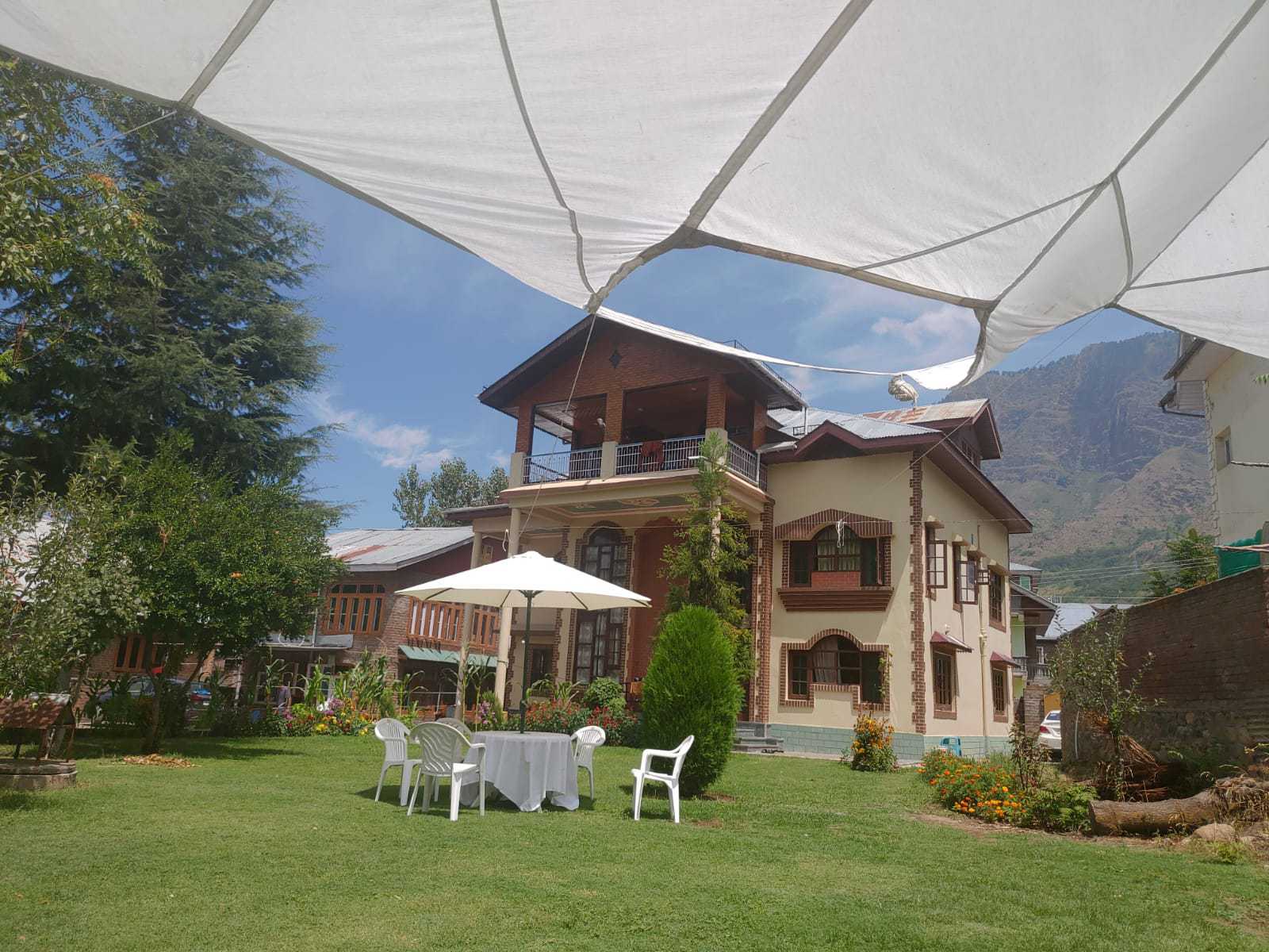 Hotel O HOME Zulal Home Stay Guest House - Tap to explore photos