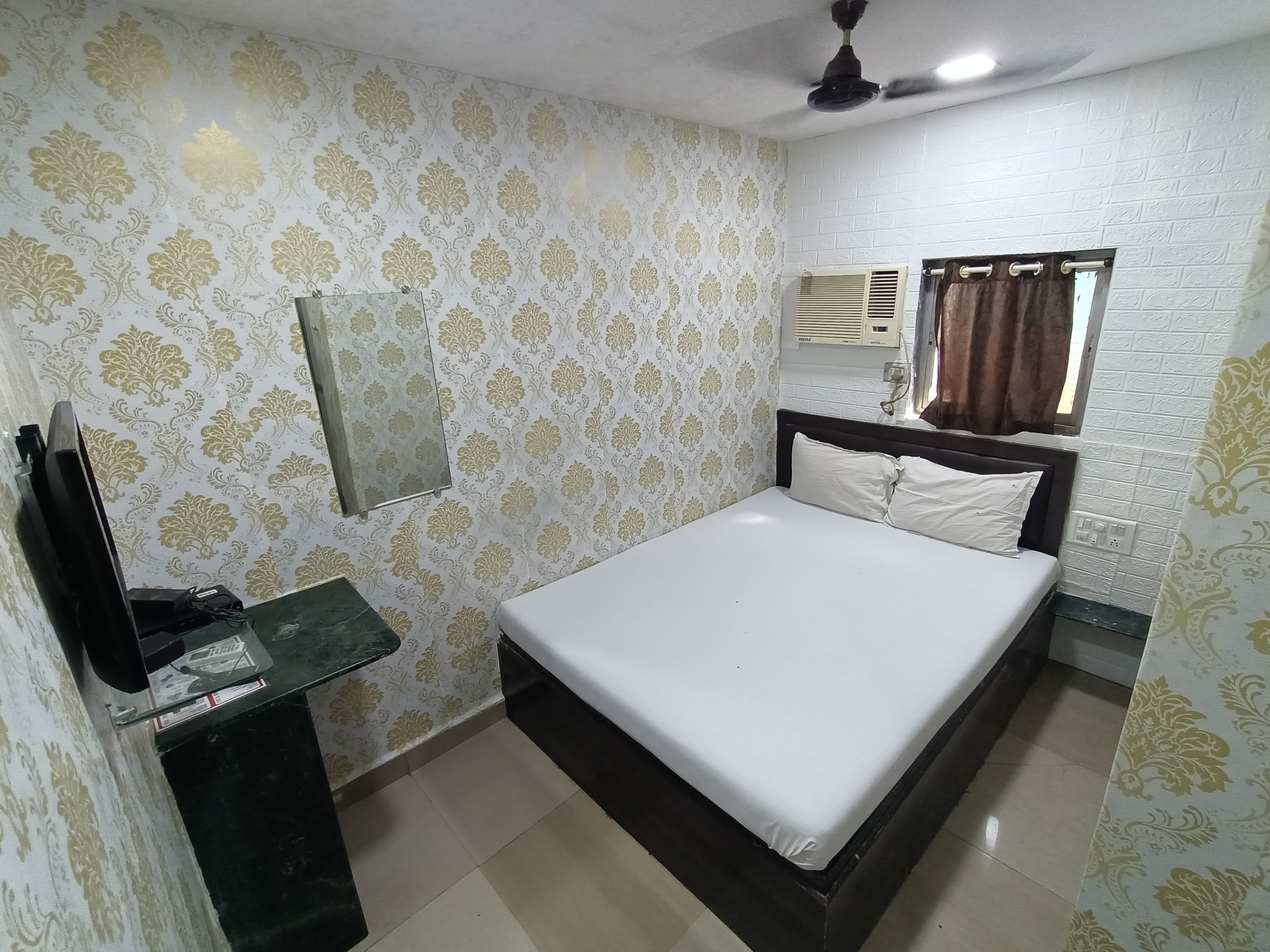 Hotel OVO Residency - Tap to explore photos