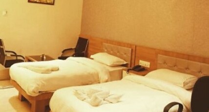 HOTEL SITARA ELITE Room Type - ELITE KING - TWIN BED