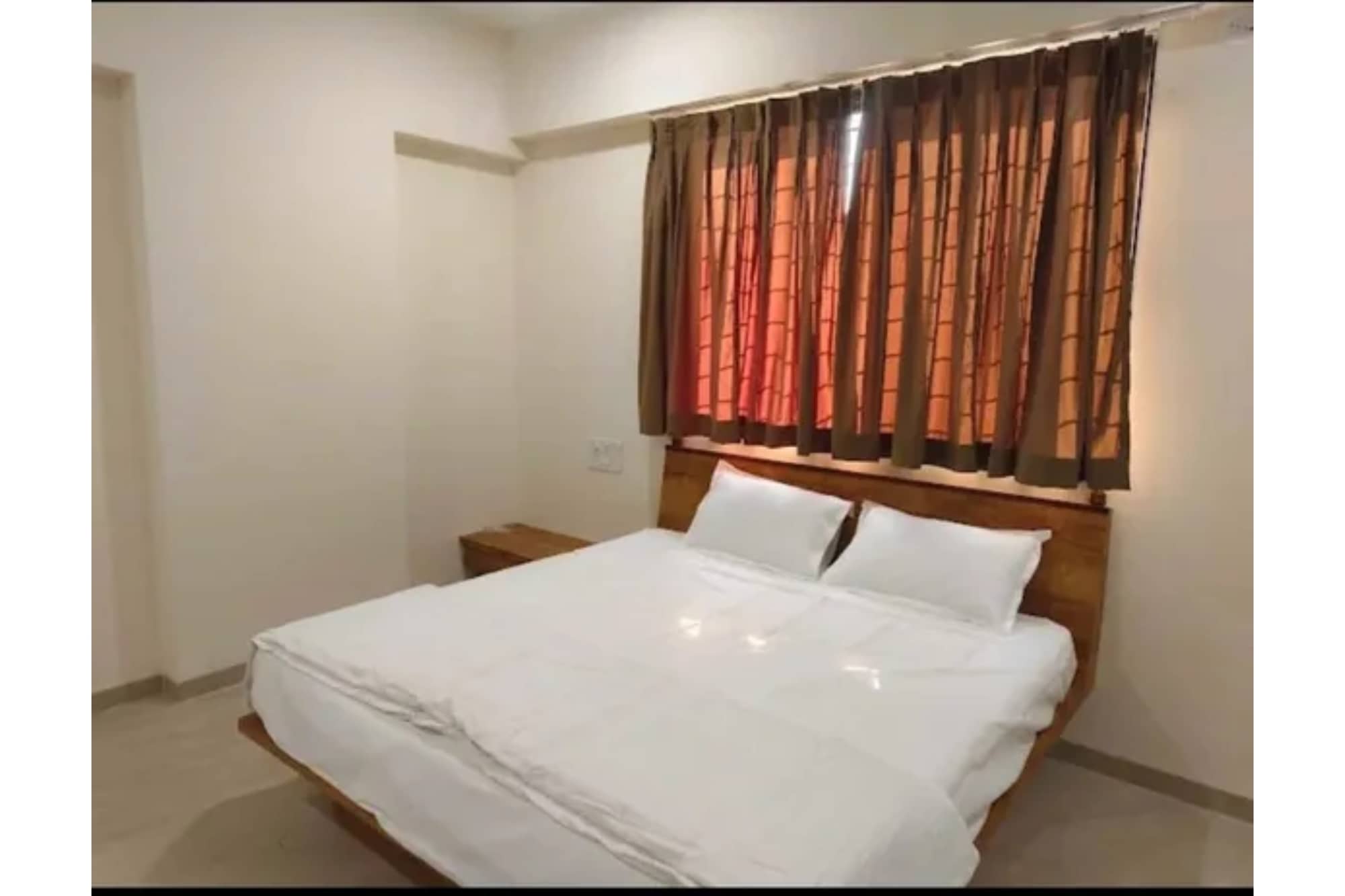 FabHotel Bhagyashri Executive - Tap to explore photos
