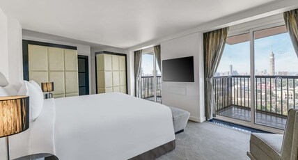 Sofitel Cairo Nile El Gezirah Room Type - Family Suite with 2 Bedrooms, 1 living Room, 1 King Size Bed, 2 Twin Beds, Panoramic Nile View Sofitel Cairo Nile El Gezirah Room Type - Family Suite with 2 Bedrooms, 1 living Room, 1 King Size Bed, 2 Twin Beds, Panoramic Nile View