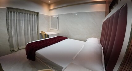 Hotel Balaji Room Type - Deluxe Family Room with King Bed & Bunk Bed