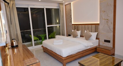 Hotel Shiv Palace Room Type - Double Occupancy Luxury room ( Balcony, City & Hill View)