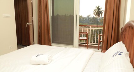 Nilgiri Woodlands Luxury Service Apartment -3BHK Apartments Room Type - Three-Bedroom Premium Apartment with Balcony Nilgiri Woodlands Luxury Service Apartment -3BHK Apartments Room Type - Three-Bedroom Premium Apartment with Balcony