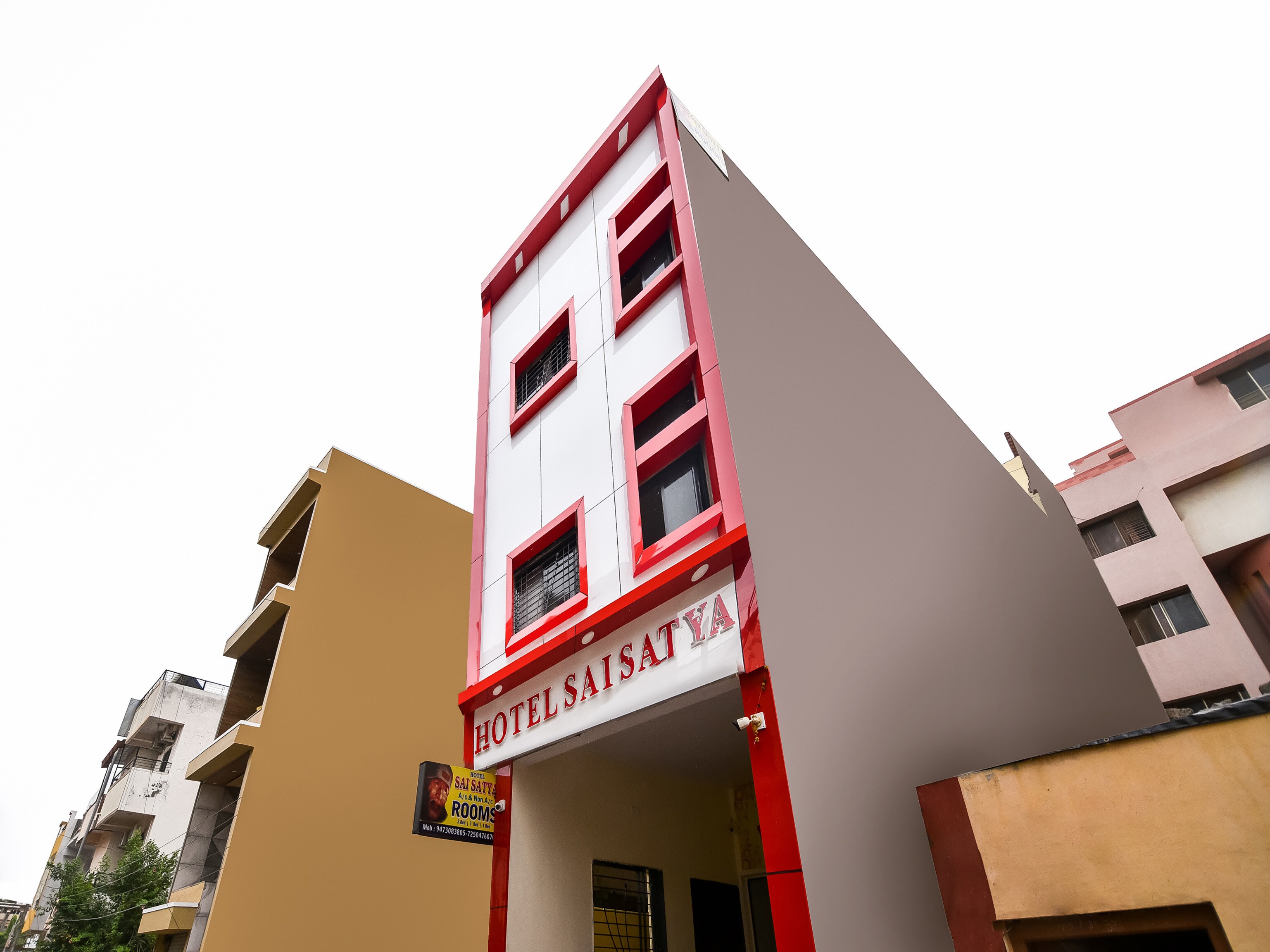 Hotel Sai Satya - Tap to explore photos