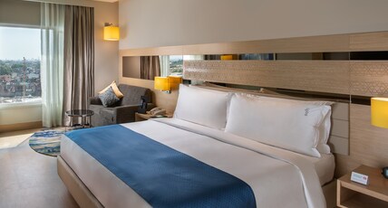 Holiday Inn Agra MG Road Room Type - King Suite with City View Non Smoking.