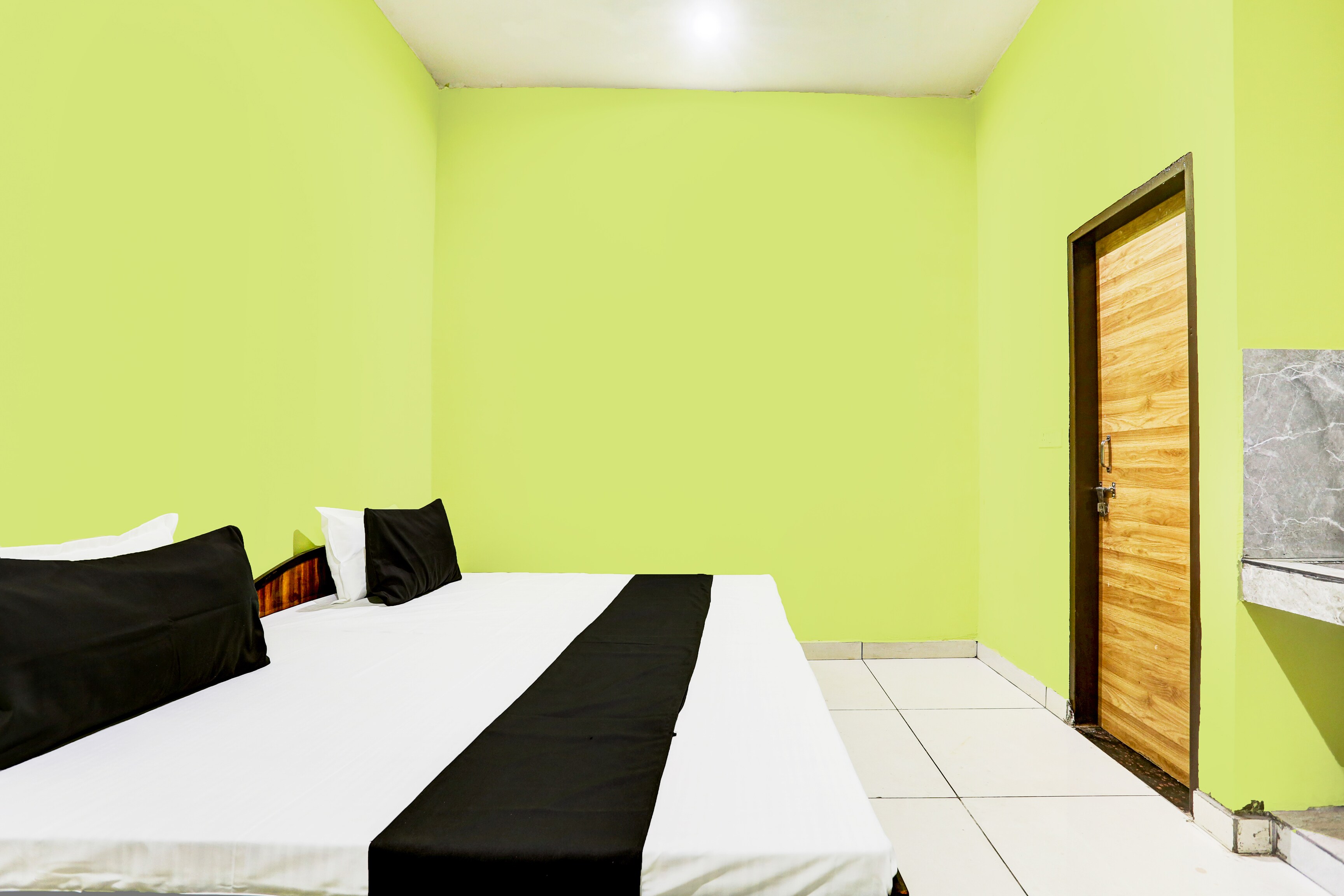 Hotel O H.R - Tap to explore photos