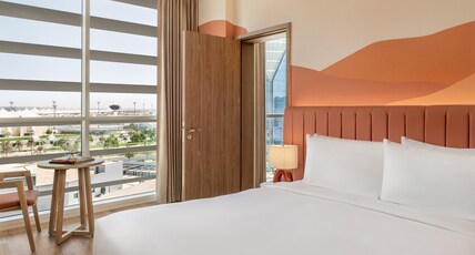 YAS PLAZA CIRCUIT by IHG - Theme Park Access Room Type - 1 Queen Family Suite Plaza View Theme Park Access YAS PLAZA CIRCUIT by IHG - Theme Park Access Room Type - 1 Queen Family Suite Plaza View Theme Park Access