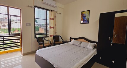 Janki Devi Home | 1 Km from Shree Ram Temple Room Type - Bedroom 2 in Flat No.24 with Common Bathroom