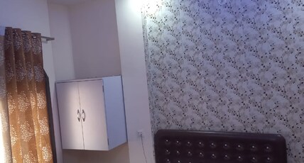 Tridev P G Residency Room Type - Deluxe Room
